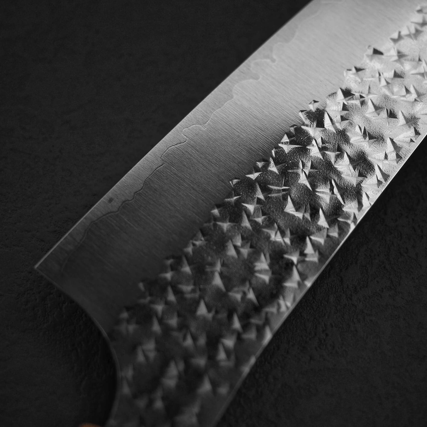 Close up view of the back side of the blade of Yu Kurosaki SG2 Senko bunka 165mm