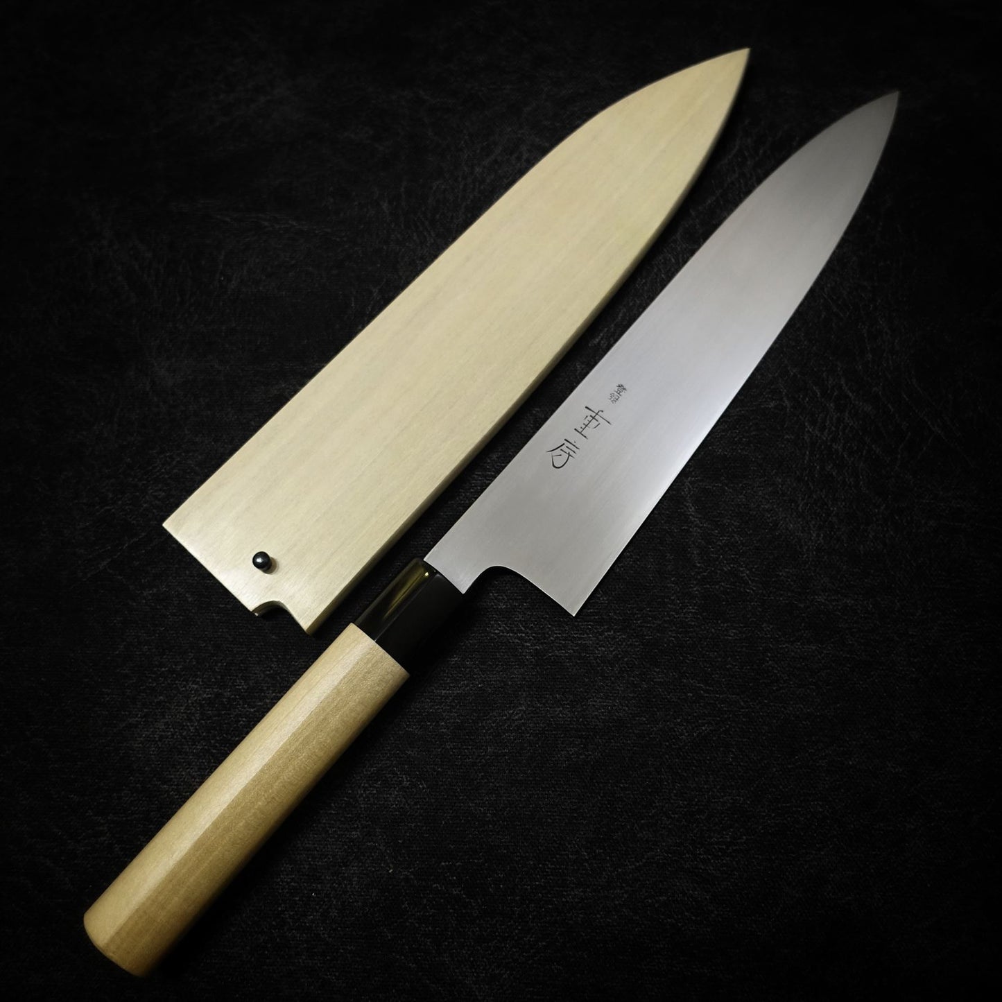 240mm Shigefusa kasumi wa-gyuto knife showing full blade profile with magnolia saya