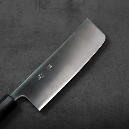 A nakiri with a rectangular blade, highlighting its clean edges and flat cutting profile.