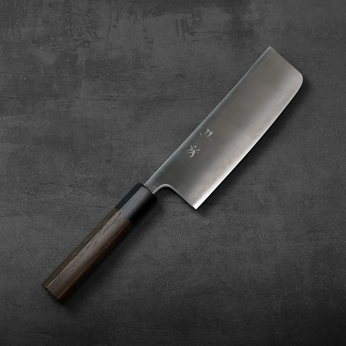 Nakiri with a wooden handle and rectangular blade, the knife is positioned for a clear side view.