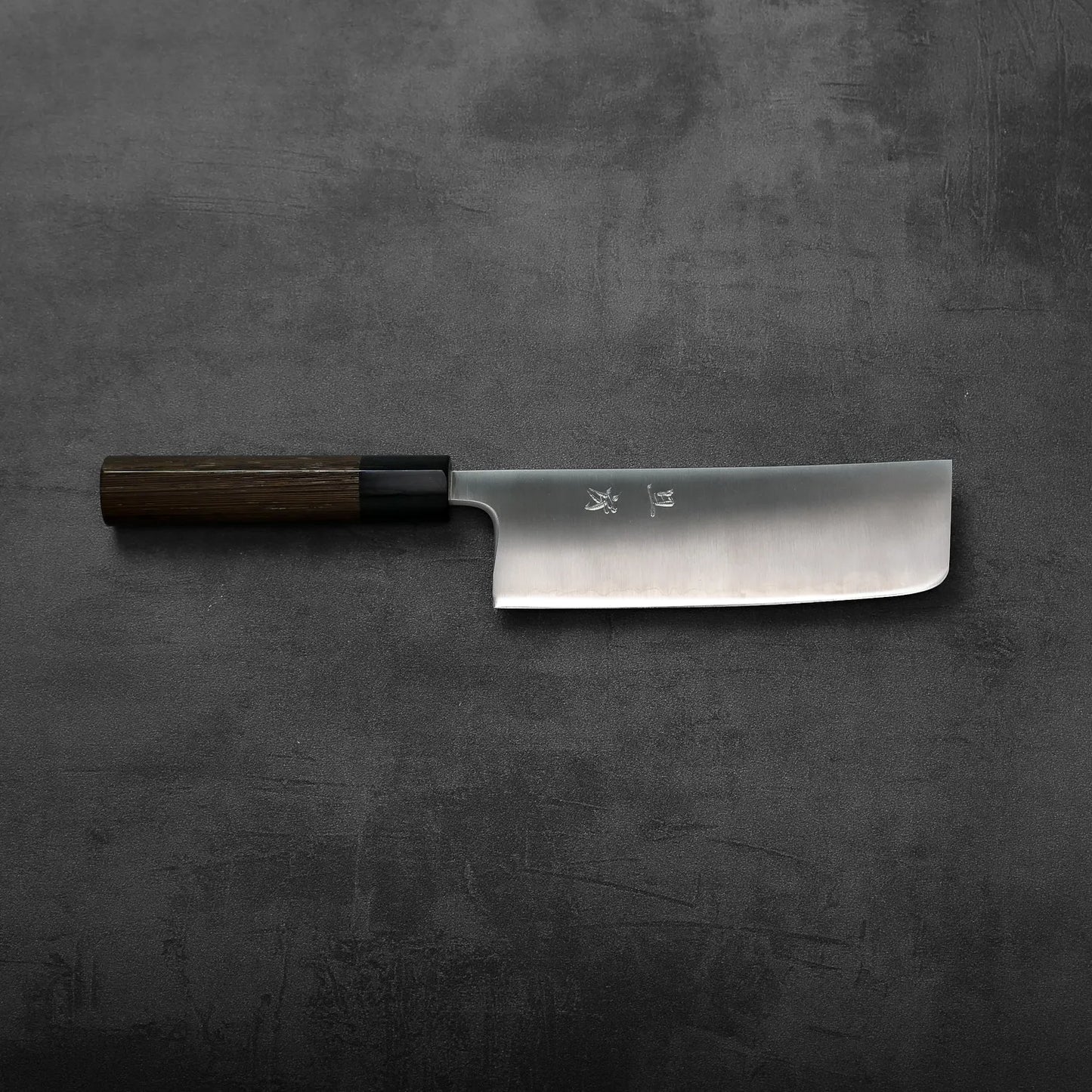 Nakiri with dark wood handle, showcasing clean lines and subtle grain along the full tang handle.