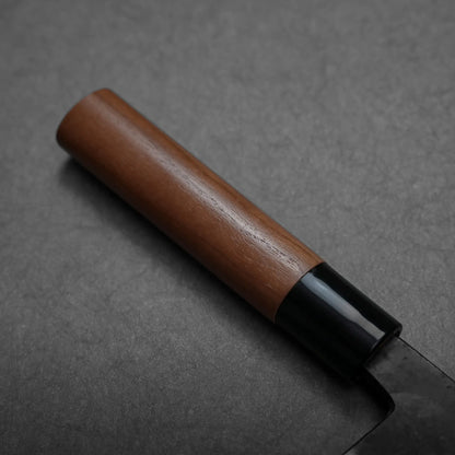 Close-up shows the blade finish and wooden handle of a Japanese knife by Daisuke Nishida, blade shape not fully visible.