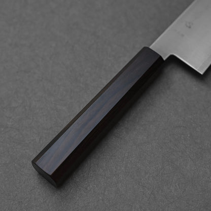 Octagonal mono handle made of ebony wood; photographed to highlight the deep, dark finish, faceted geometry, and sleek craftsmanship of the single-piece design.