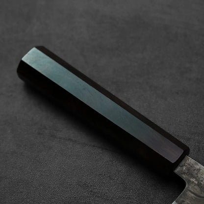 Close-up of handle with visible details and materials. Knife type: gyuto.