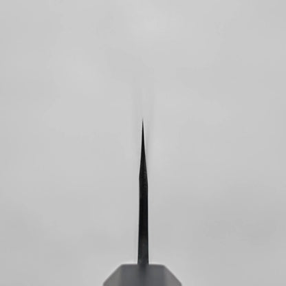Close-up of a Japanese knife showing the choil shot