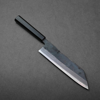 Straight-edged blade and black handle of a Japanese knife, kiritsuke gyuto style, blade finish appears smooth.