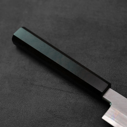 Yanagiba knife handle and blade showing detailed features and textures, photographed up close.