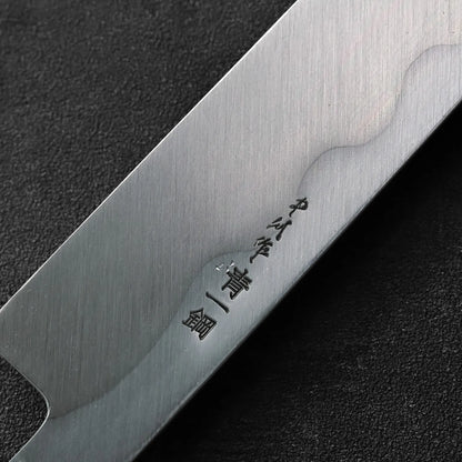 Close-up of a yanagiba 300mm blade featuring kanji characters on its surface.