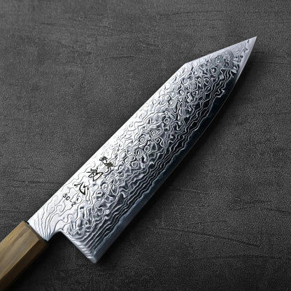 Bunka knife with a patterned blade and wood handle, showing layered steel grain and natural wood texture.