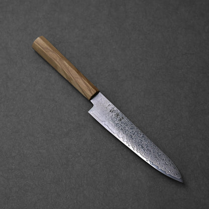 SG2 damascus petty knife with olive wood handle; photographed in angled orientation to show the front side of the blade, including the damascus pattern, SG2 marking, and wood grain.