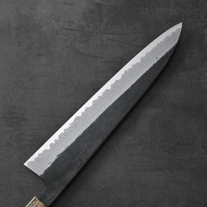 A gyuto with kurouchi damascus pattern and AS steel, 240mm in length, is shown.