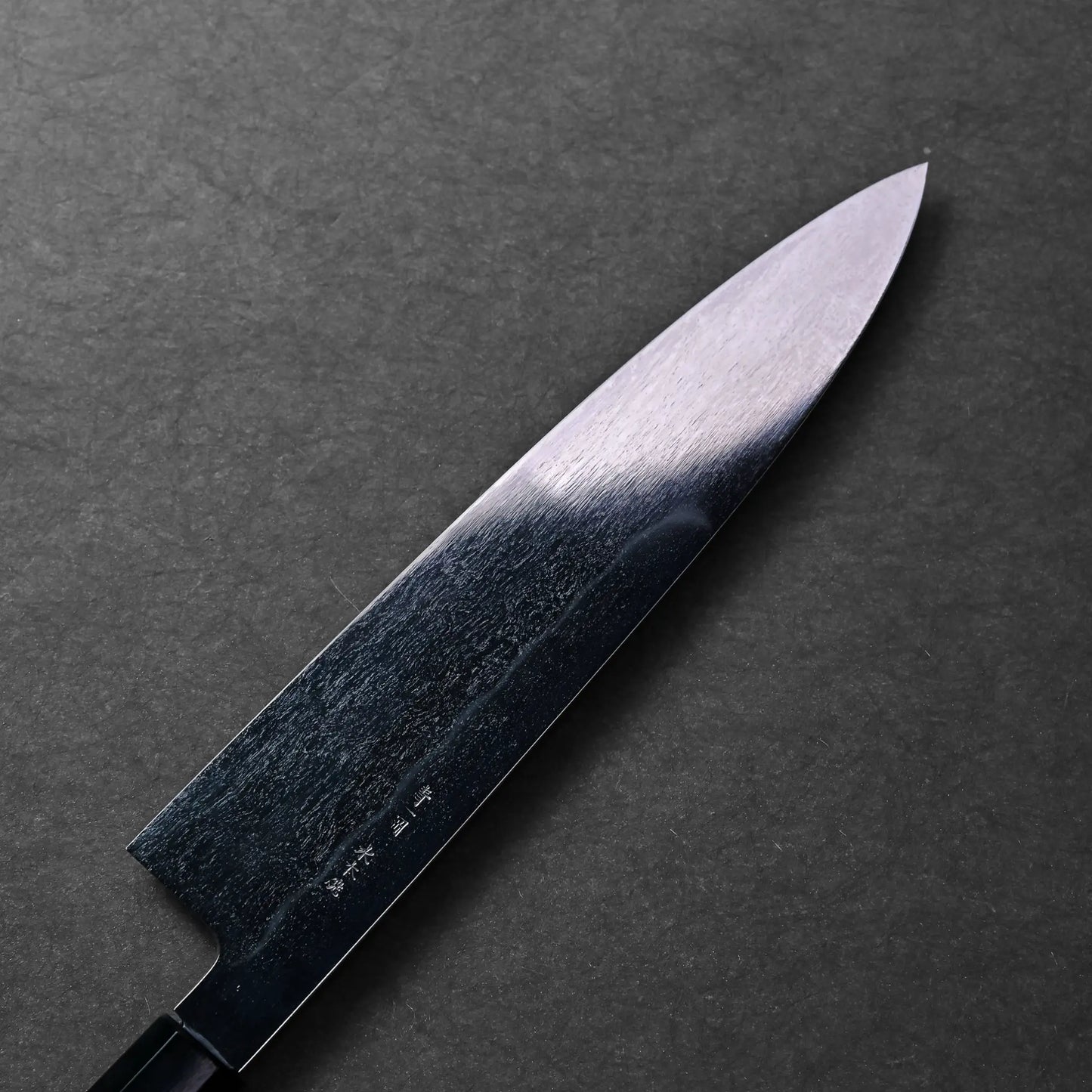 The image shows a Mizuhonyaki Gyuto Japanese knife with a long, gently curved blade and polished finish.