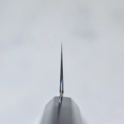 Choil shot of a Japanese knife showing thin blade cross-section.