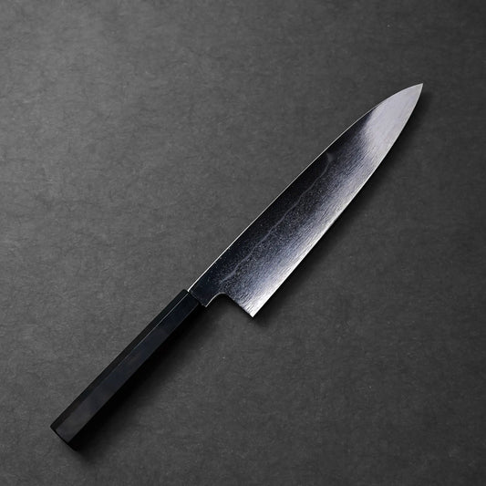A Kenji Togashi aogami#1 mizuhonyaki gyuto 240mm, gyuto style, shows a gently curved blade and subtle hamon line.