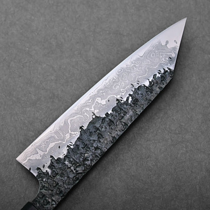 Close-up shows a patterned, textured blade surface of a Japanese knife, likely kiritsuke gyuto style.