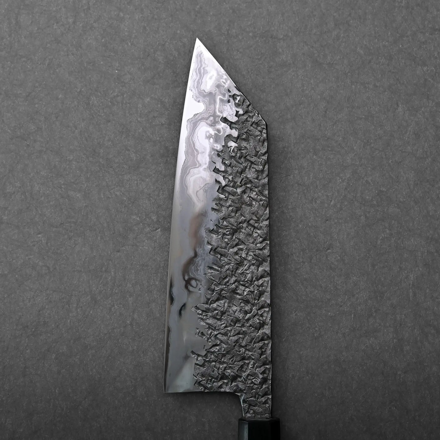 The image shows a bunka-shaped Japanese knife with a textured, patterned Aogami #1 damascus steel blade.