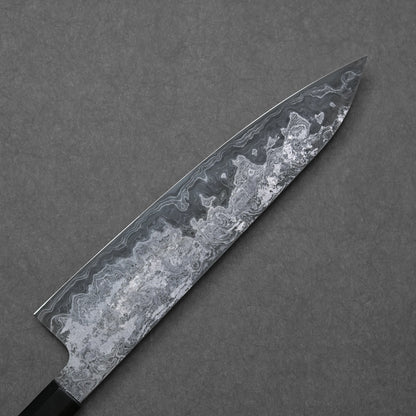 Decorative knife with a unique blade pattern on a gray background