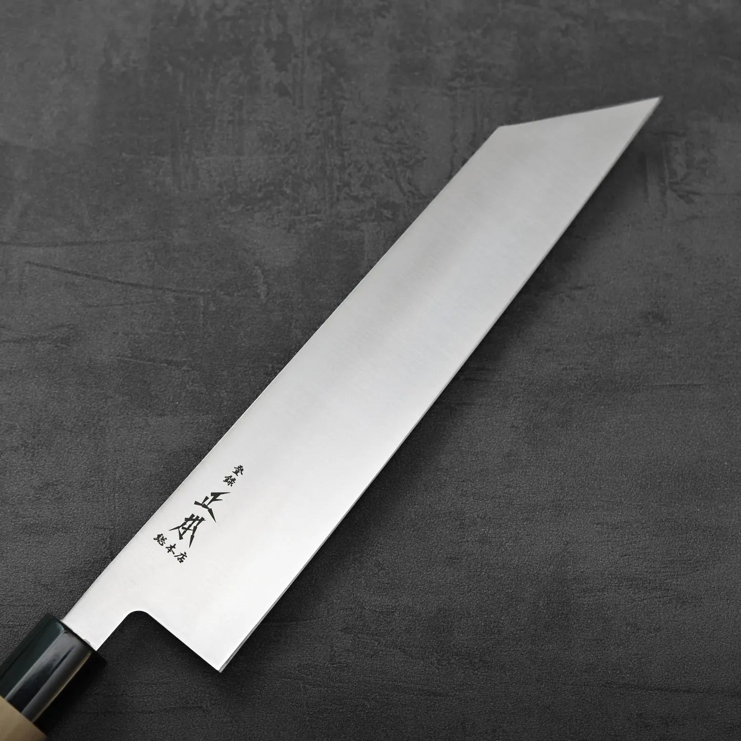 Kiritsuke gyuto with saya, featuring a straight edge and angled tip.