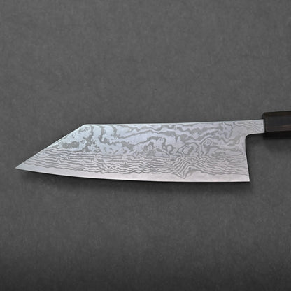 A close-up of a chefs knife with a distinctive, wavy Damascus steel pattern on the blade—possibly a Miyazaki bunka—is shown against a plain, dark gray background. The wooden handle is partially visible on the right side.