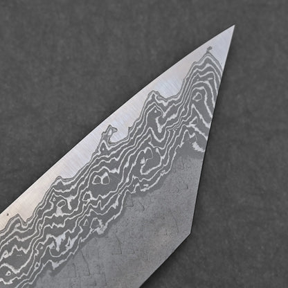 Close-up of the Nigara Tsuchime Damascus VG10 Kiritsuke Gyuto 210mms pointed blade tip, highlighting its unique wavy damascus patterns against a dark gray background.