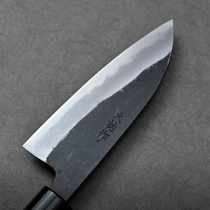 The image shows a Japanese knife with shirogami steel, a slim petty blade, dark finish, and kanji markings on the blade.