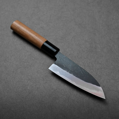 A wooden-handled Japanese knife with a wide petty blade, straight edge, and visible satin blade finish.