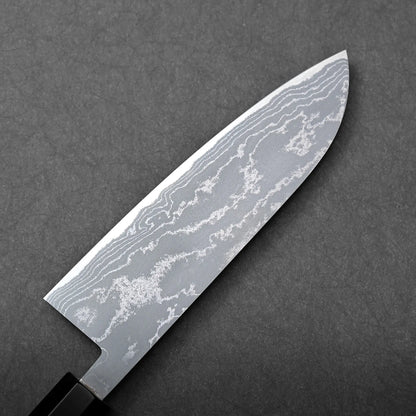 A close-up shows a Japanese knife, specifically a santoku, with visible wavy damascus patterns on the blade.