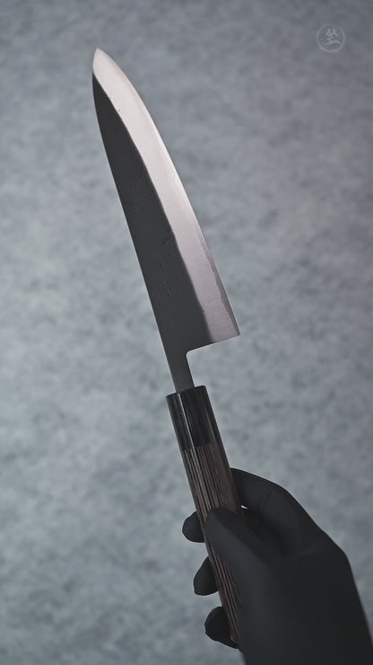 A detailed showcase video of the Ohishi Kurouchi SLD Gyuto 210mm, highlighting its dark kurouchi finish, finely honed edge, and ergonomic wenge handle from multiple perspectives