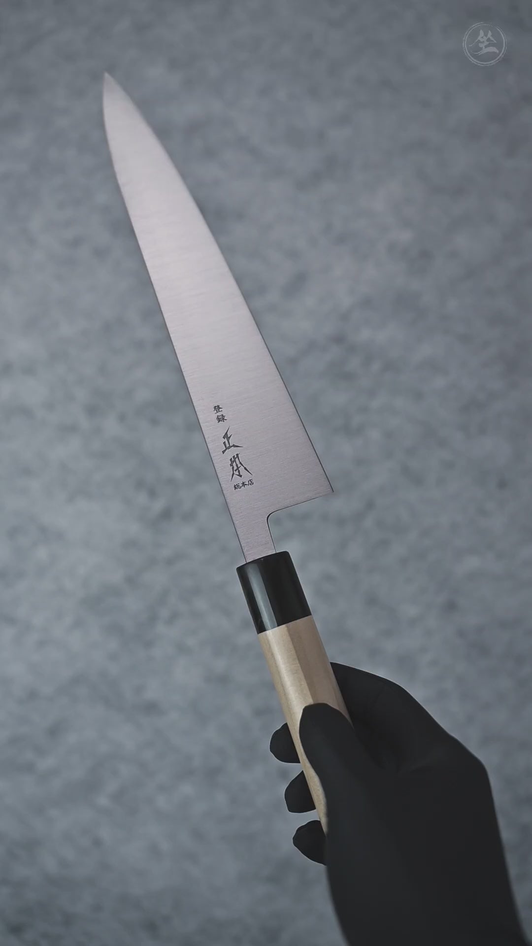 Short video showcasing a gyuto knife from Masamoto Sohonten, rotating to display the blade and overall craftsmanship from multiple angles.