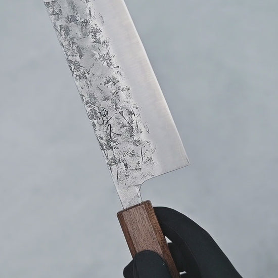 Video showing Tsunehisa SLD nakiri knife from different angles with close-up views.