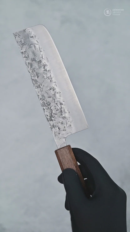 Video showing Tsunehisa SLD nakiri knife from different angles with close-up views.