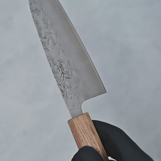 Video showing Tsunehisa nashiji SLD santoku knife from different angles with close-up views.