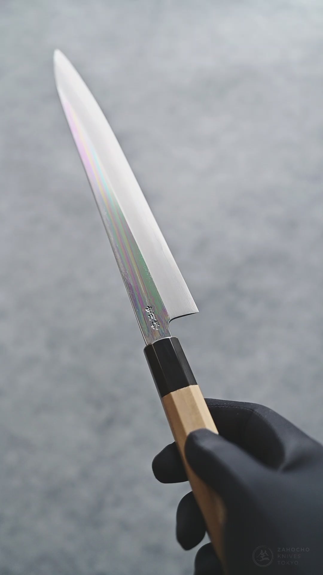 Nakagawa ginsan petty knife shown from different angles, with close-up views of the blade finish and details.