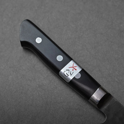 Nakiri handle close-up with two rivets and a silver Fujiwara label, showing detailed construction.