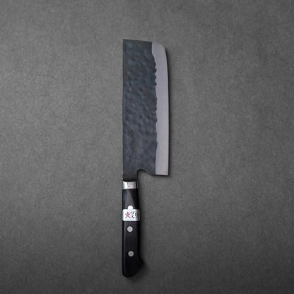 Nakiri with a dark hammered blade and black handle.