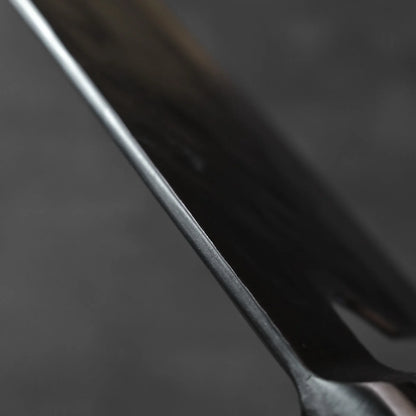 Close-up of tall bunka 175x60mm blade, showcasing profile and edge details.