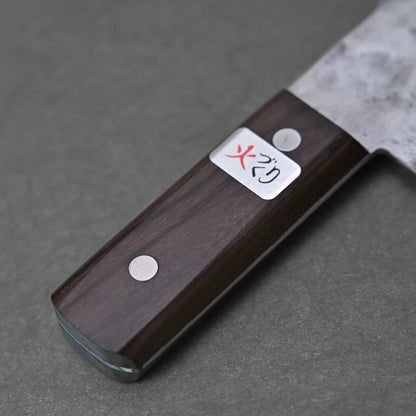 Close-up of the Teruyasu Fujiwara nashiji shirogami#1 chuka bocho 210x90mm, showing its dark wooden handle with two metal rivets, a rectangular label with Japanese characters (one in red), and a partially visible Shirogami#1 steel blade.