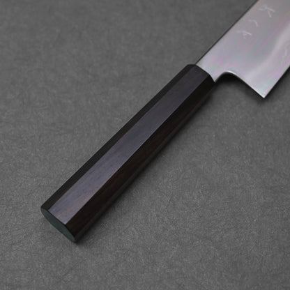 Close up of mono octagonal ebony handle on a gyuto knife
