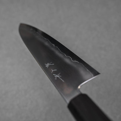 Gyuto knife made with ginsan steel; shown in diagonal orientation to highlight the full blade profile
