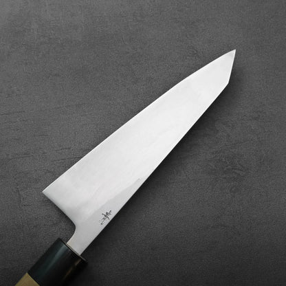 Honesuki 150mm knife with a pointed blade and a partial view of a dark handle.