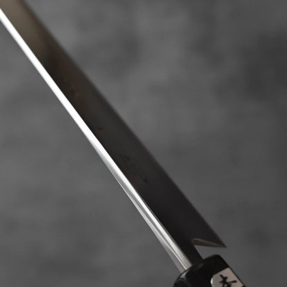 Sujihiki 270mm with a long, thin blade and a dark handle featuring a small Japanese label.
