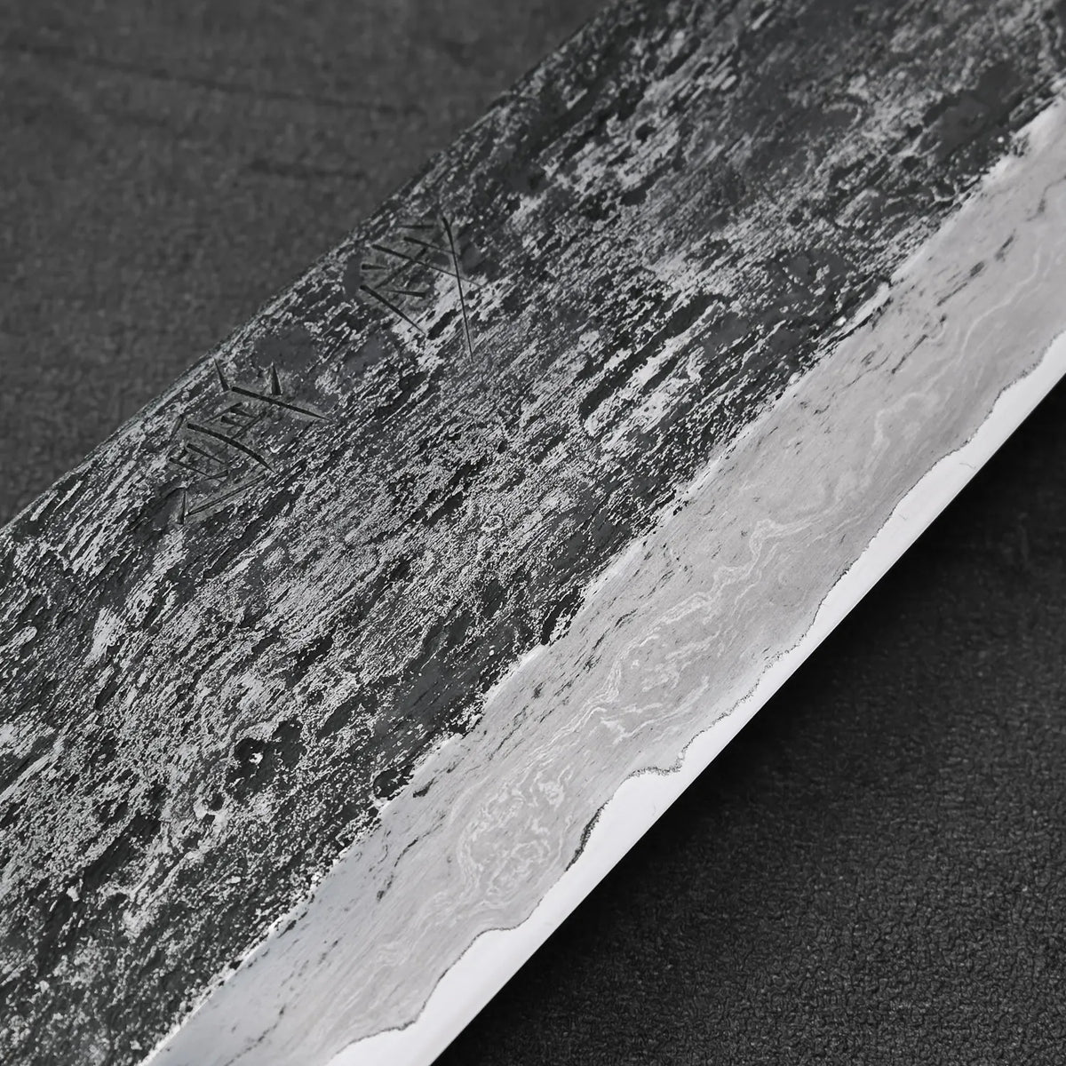 Gyuto with extra tall 240x58mm blade featuring a distinctive pattern.