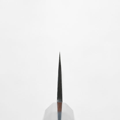 Choil shot of a gyuto, 240x55mm, positioned tip upward 