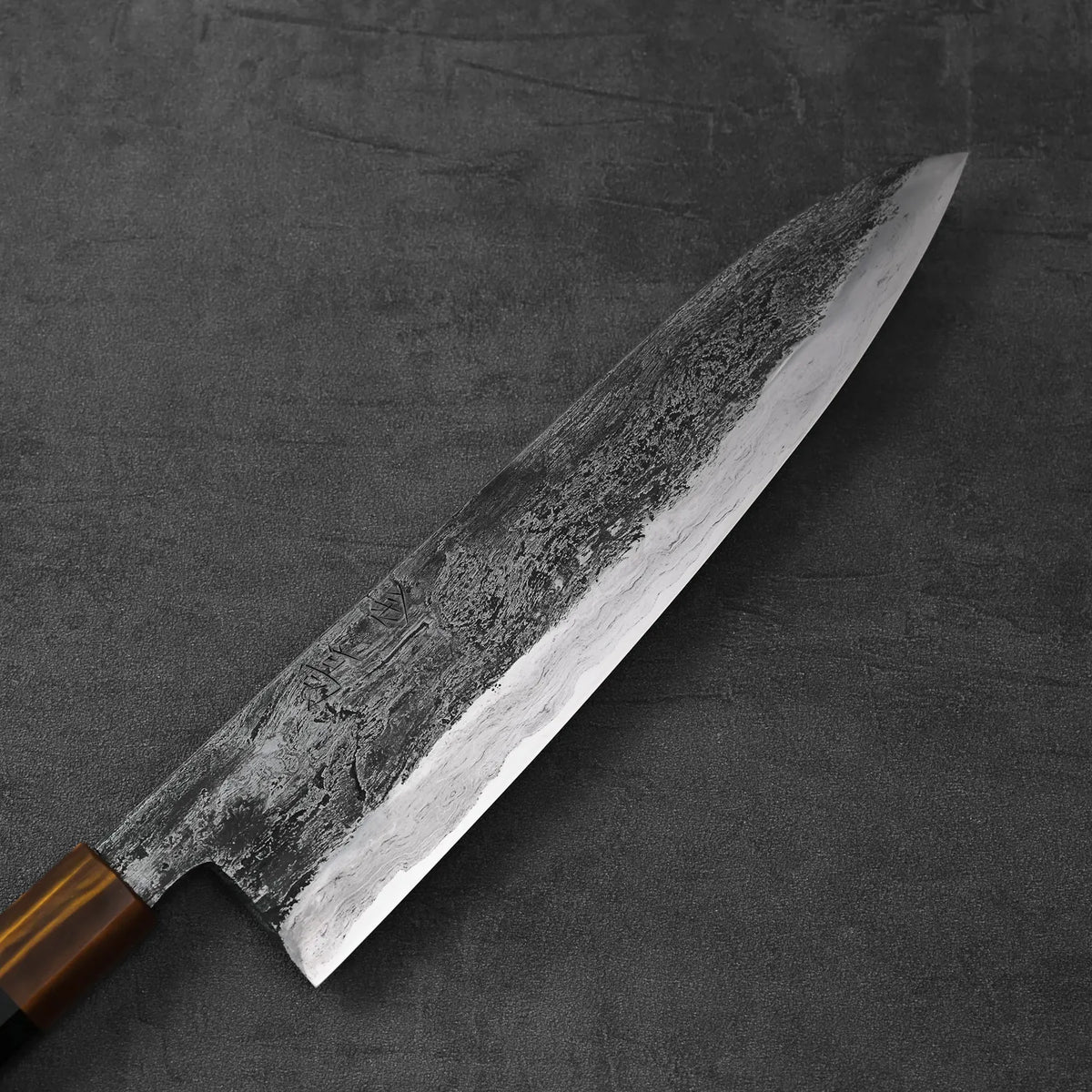 A gyuto with a wood handle, featuring a tall 240x55mm blade, is displayed prominently.