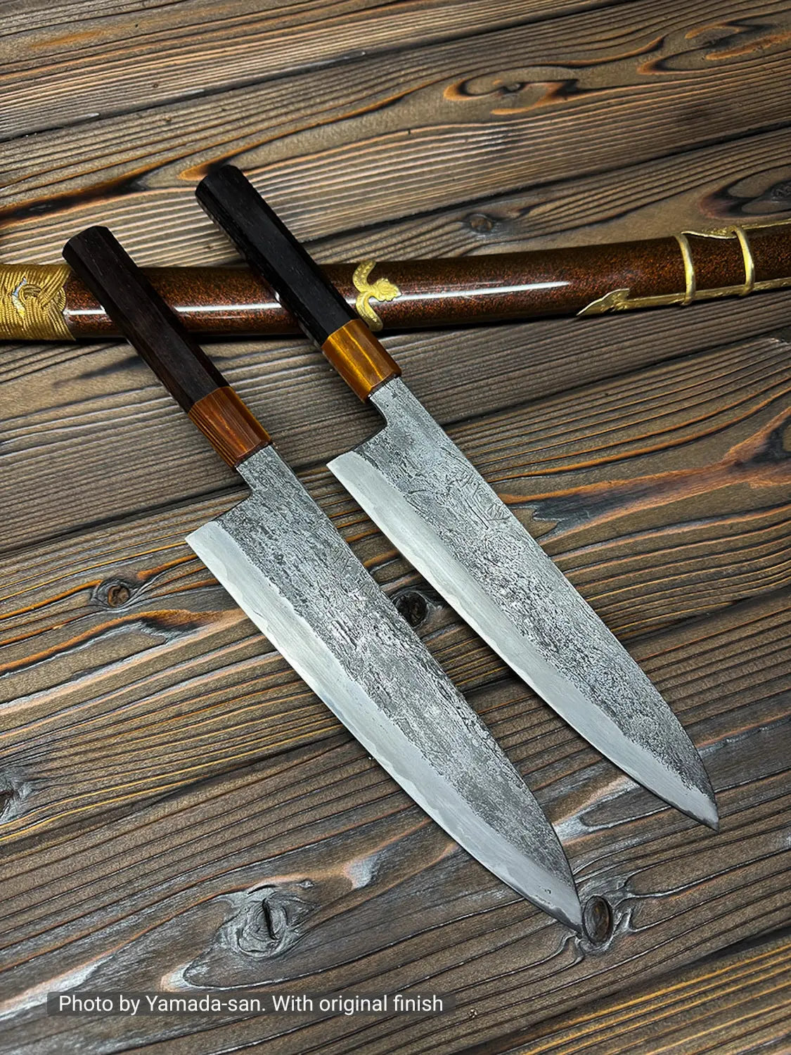 A gyuto with an extra tall blade, 240x58mm, is shown beside a sheath.