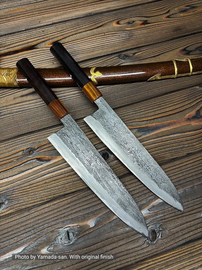 A gyuto with an extra tall blade, 240x58mm, is shown beside a sheath.