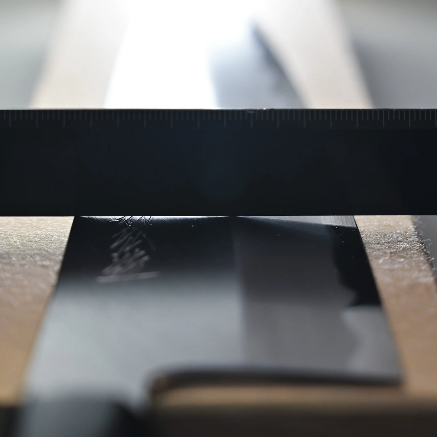 Grind of AS gyuto showing the concave hira