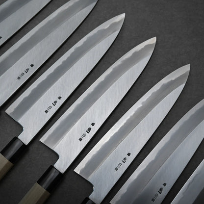 Set of Japanese chef knives with engraving on the back side