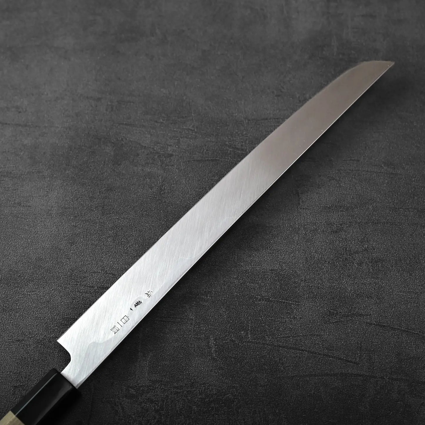 Sakimaru sujihiki with saya, 270mm blade, featuring a clean profile and polished finish.