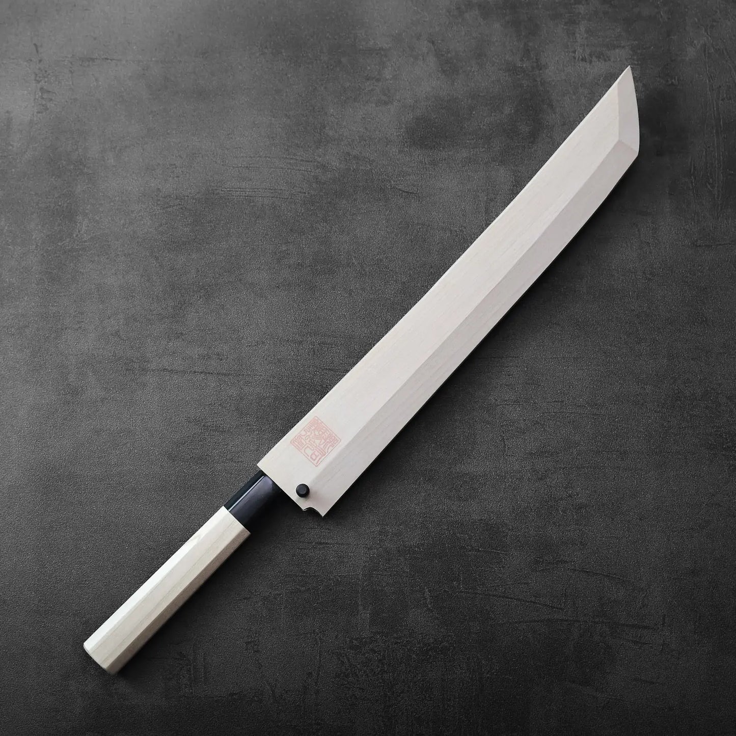 Sakimaru sujihiki, hand-forged Japanese knife with saya and a long, gracefully curved blade.